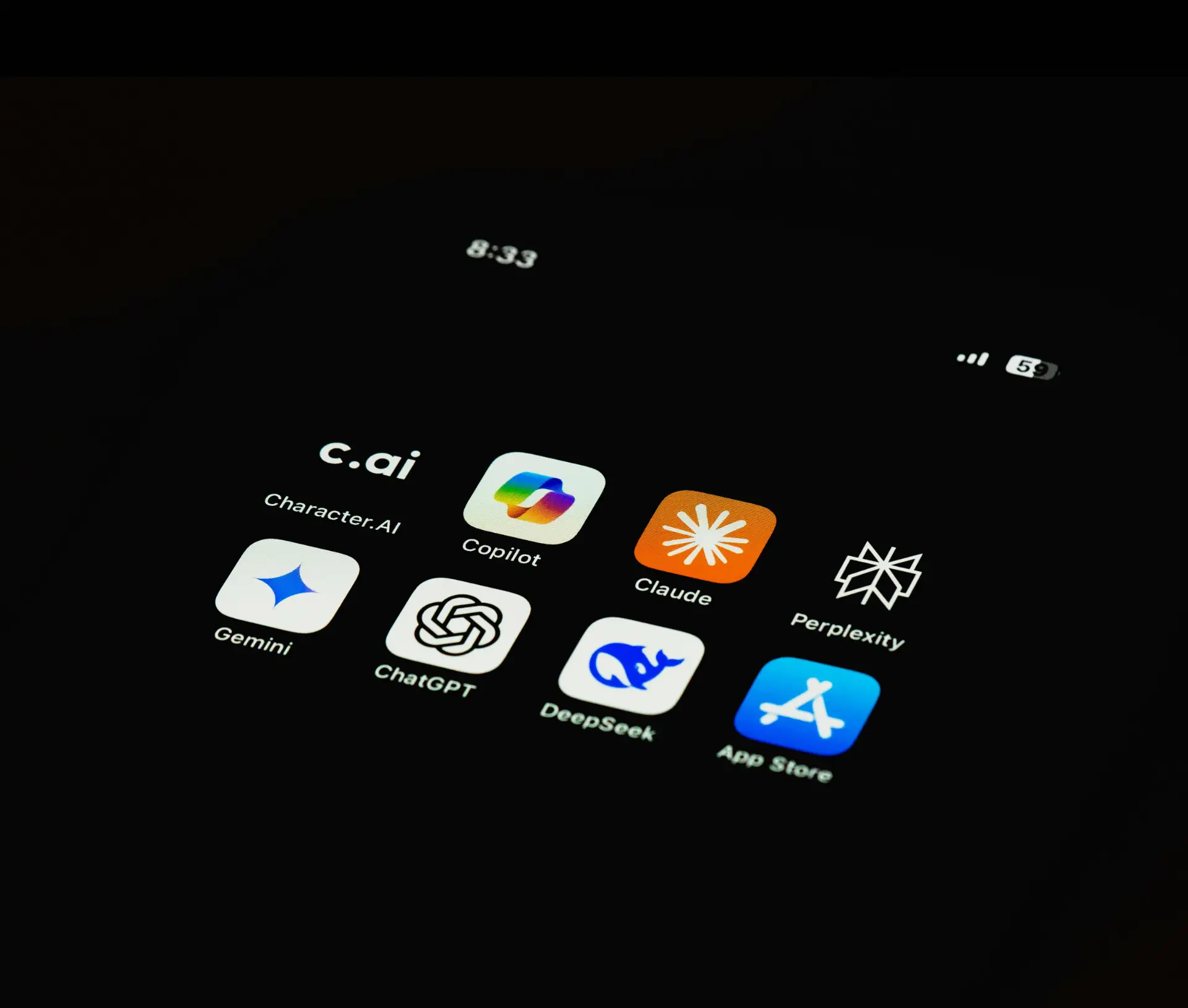 A smartphone screen shows app icons for Character.AI, Copilot, Claude, Perplexity, Gemini, ChatGPT, DeepSeek, and the App Store on a black background—perfect tools for managing your business budget. The time displayed is 8:33.