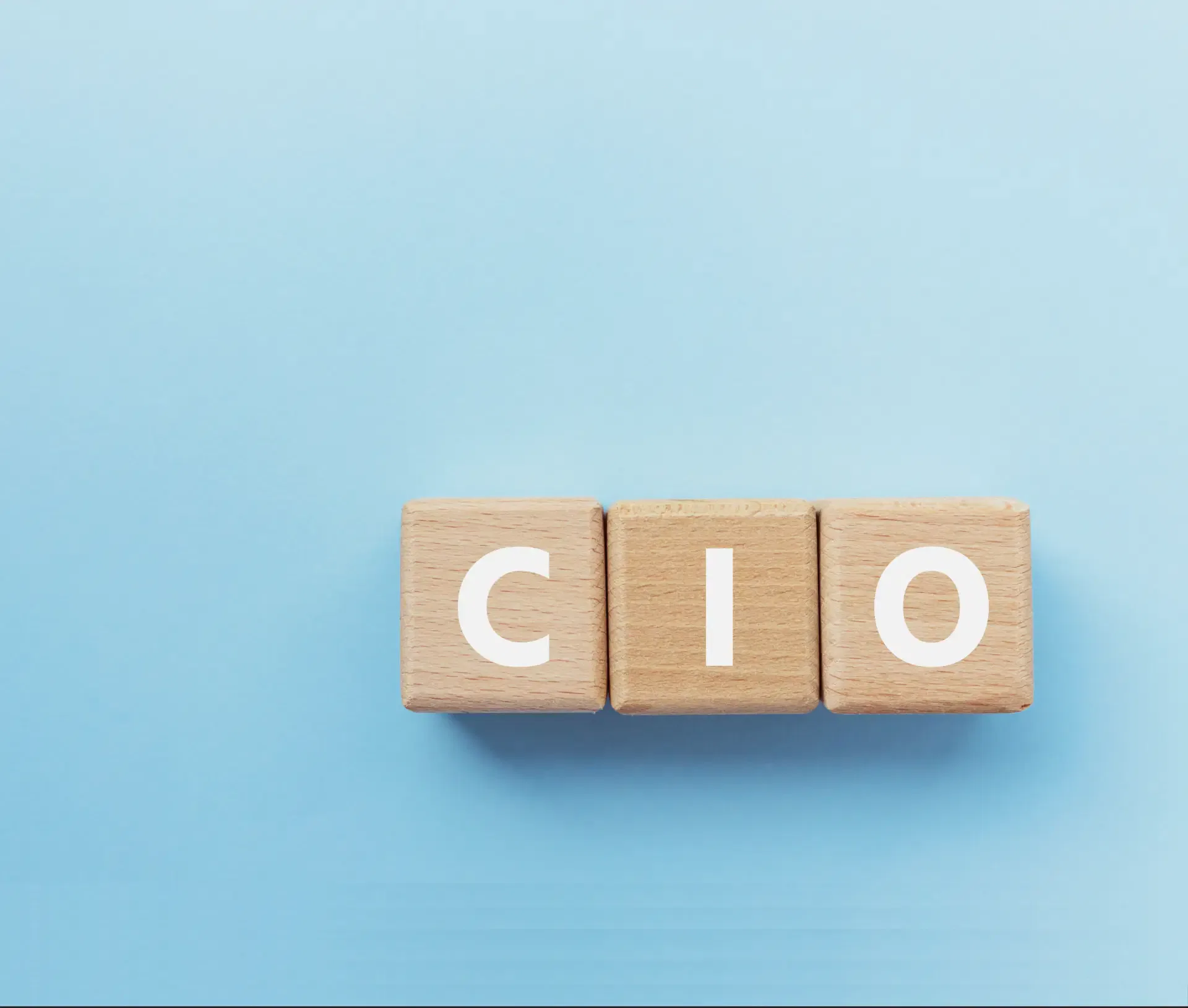 Three wooden blocks with the white letters