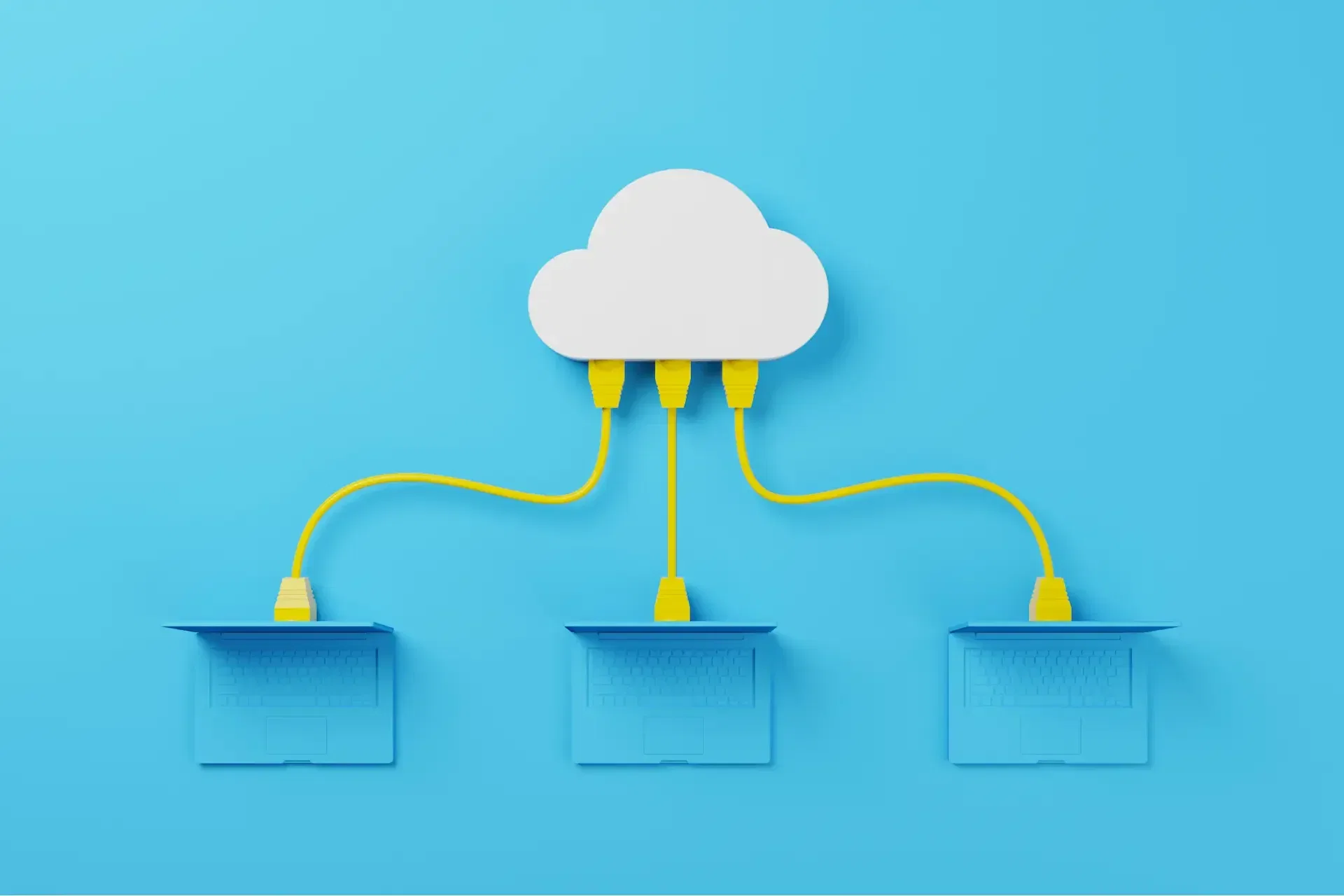 A white cloud icon is connected by yellow cables to three blue laptop icons on a blue background, illustrating cloud computing and scalable identity management.