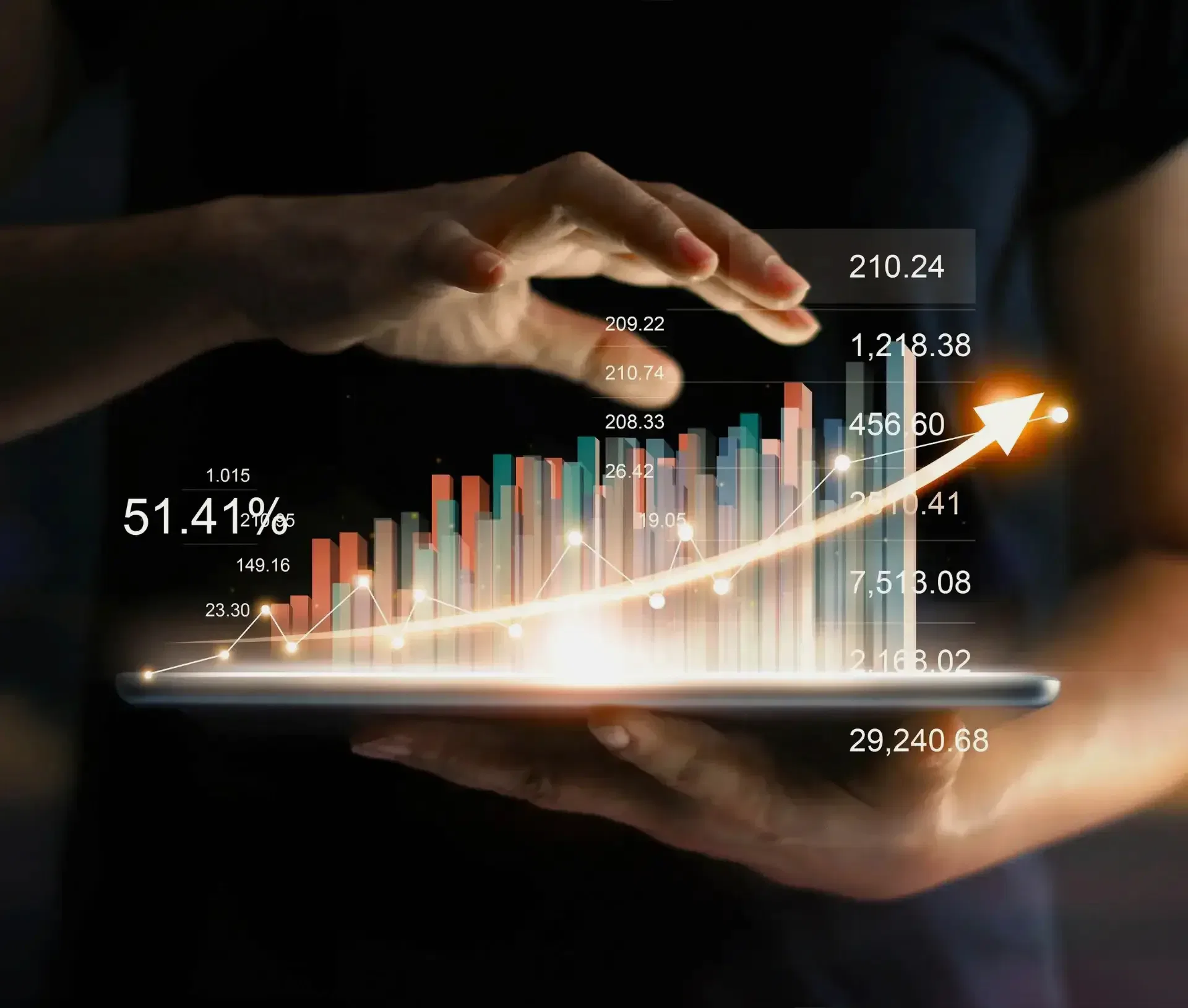A person holds a tablet displaying colourful bar graphs, numbers, and a glowing upward arrow, symbolising how technology for business growth and data analysis drive financial success. Light effects highlight the digital interface.
